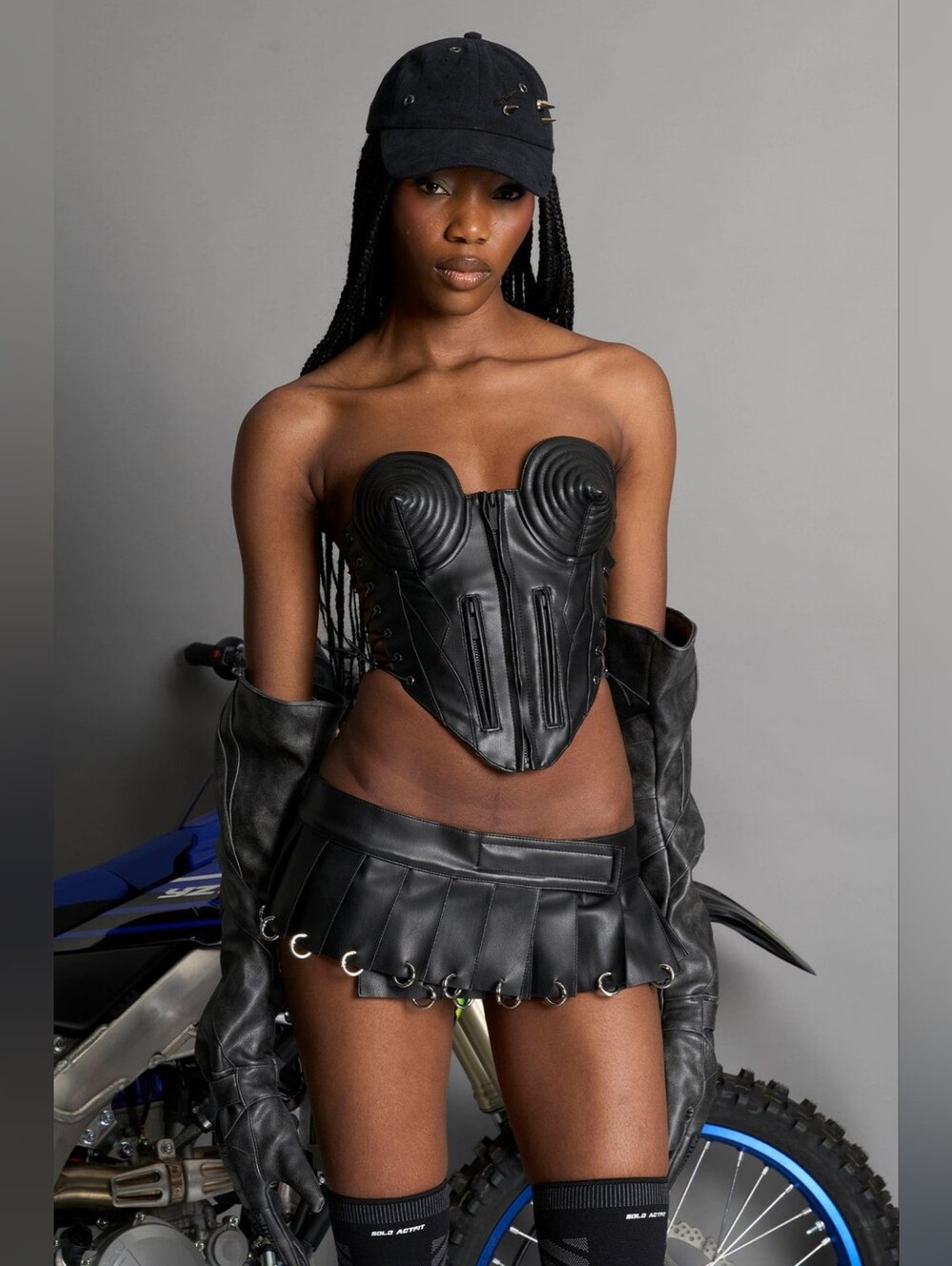 NAMILIA Pleated Mini Skirt With Rings